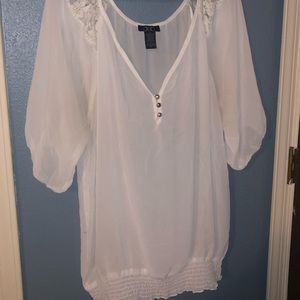 Flowing blouse with pretty lace shoulders